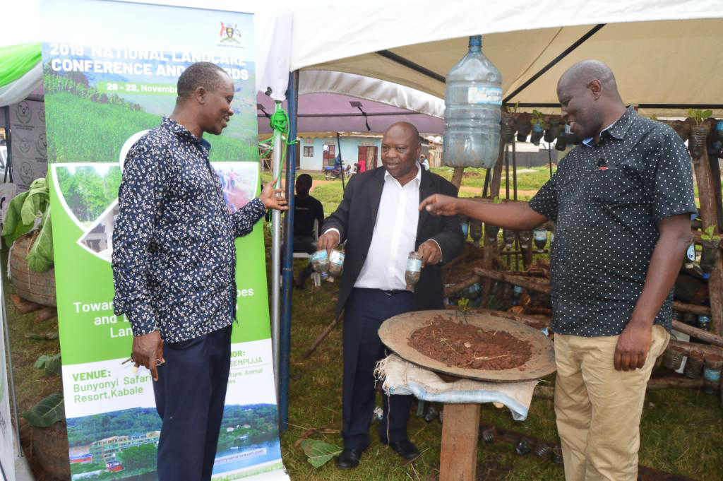 4. ULN staff show casing their products during the agricultural exhibiton in Lukaya town council.